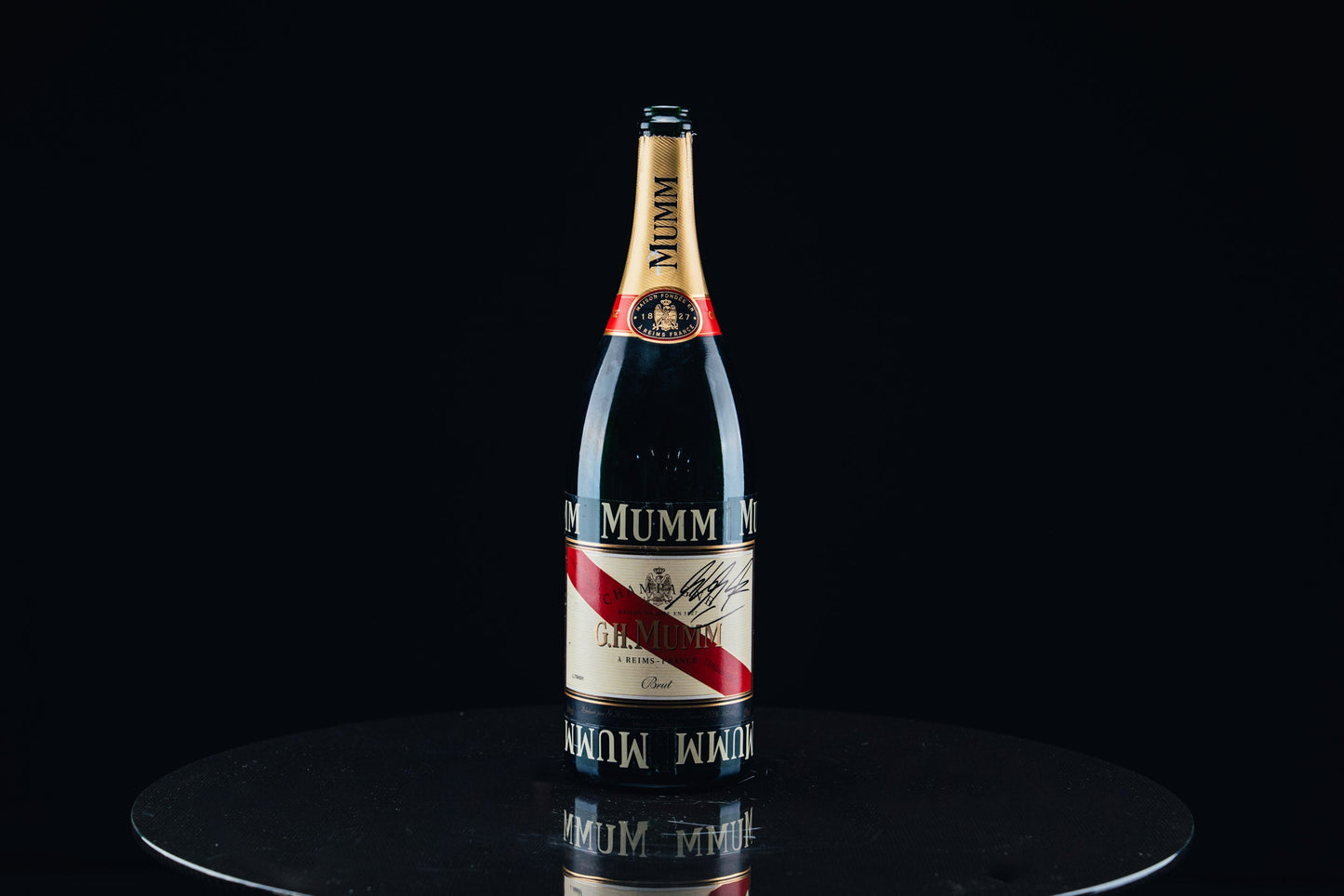 1053 - Mumm Podium Bottle Signed from Michael Schumacher