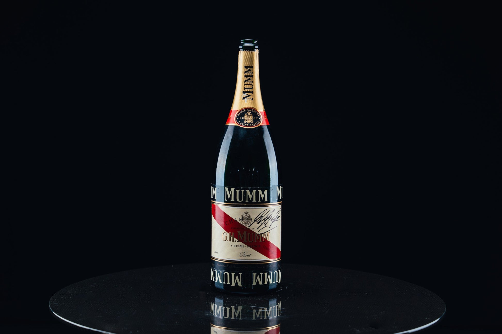 1053 - Mumm Podium Bottle Signed from Michael Schumacher