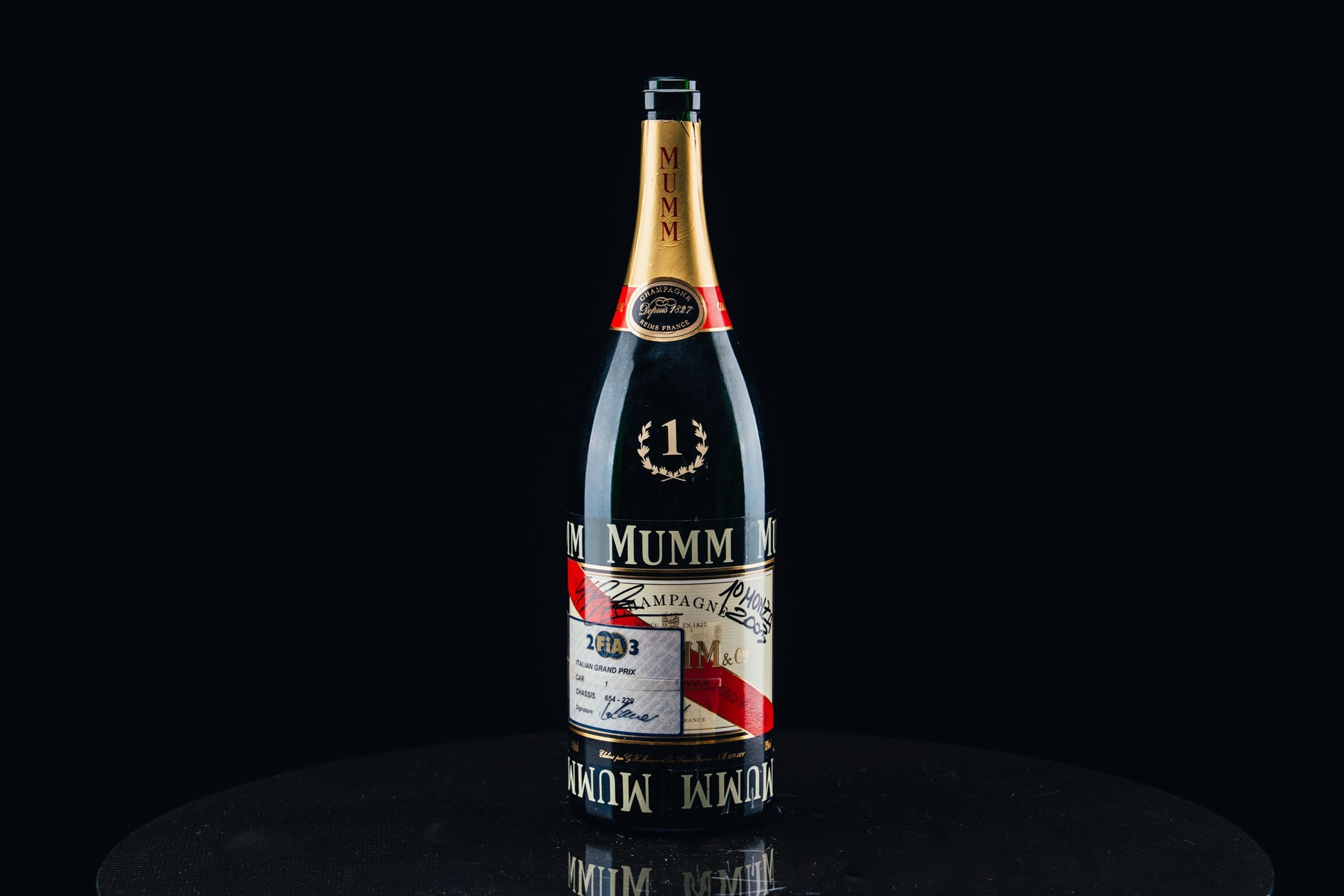 1052 - Mumm Podium Bottle Signed from Michael Schumacher