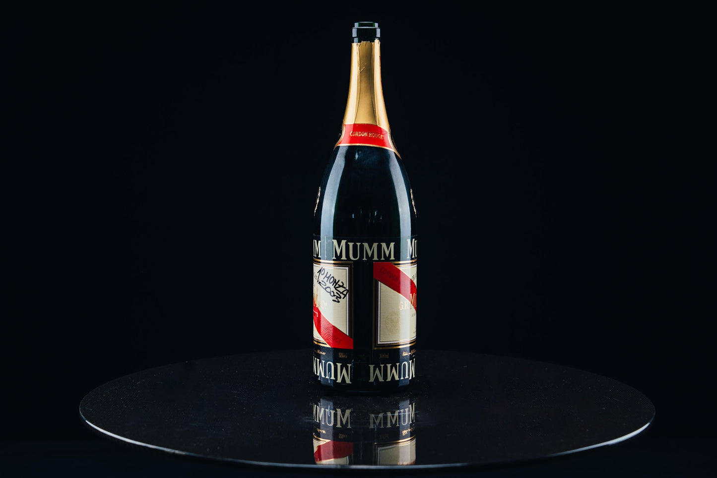 1052 - Mumm Podium Bottle Signed from Michael Schumacher