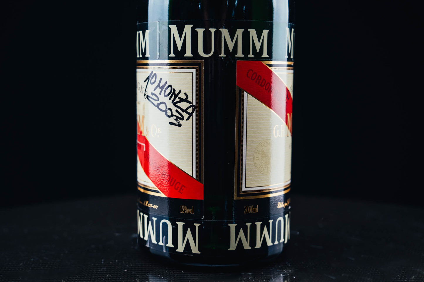 1052 - Mumm Podium Bottle Signed from Michael Schumacher