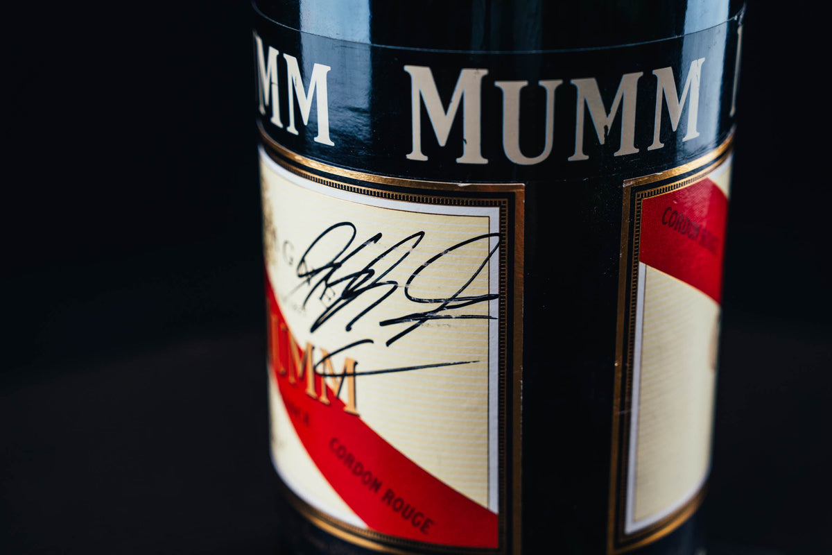 Mumm Podium Bottle Signed from Michael Schumacher