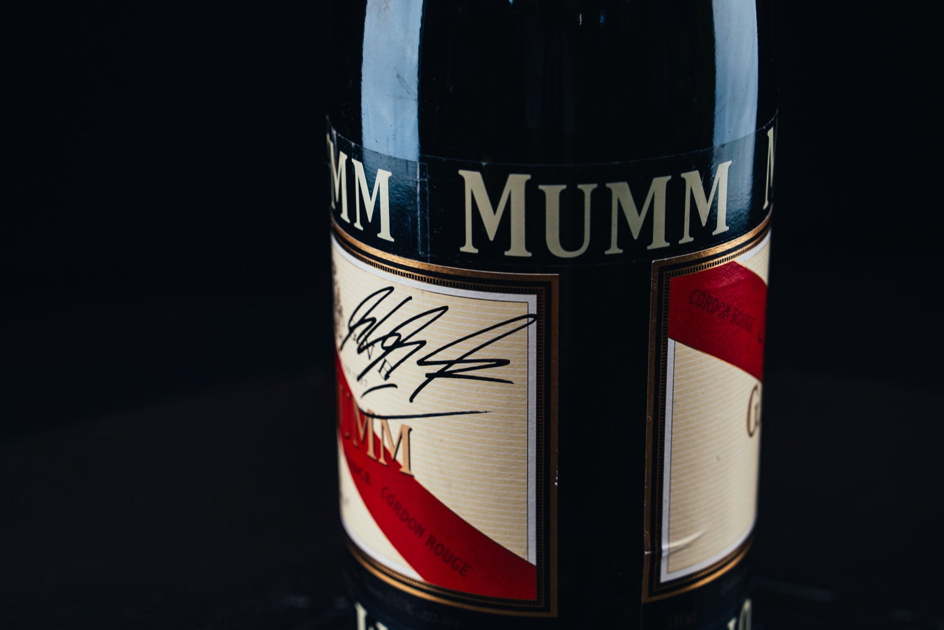 1053 - Mumm Podium Bottle Signed from Michael Schumacher