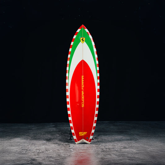 Scuderia Ferrari Limited Edition Surfboard, inspired by the Ferrari Challenge Stradale. / Tavola da surf Scuderia Ferrari in edizione limitata, ispirata alla Ferrari Challenge Stradale.