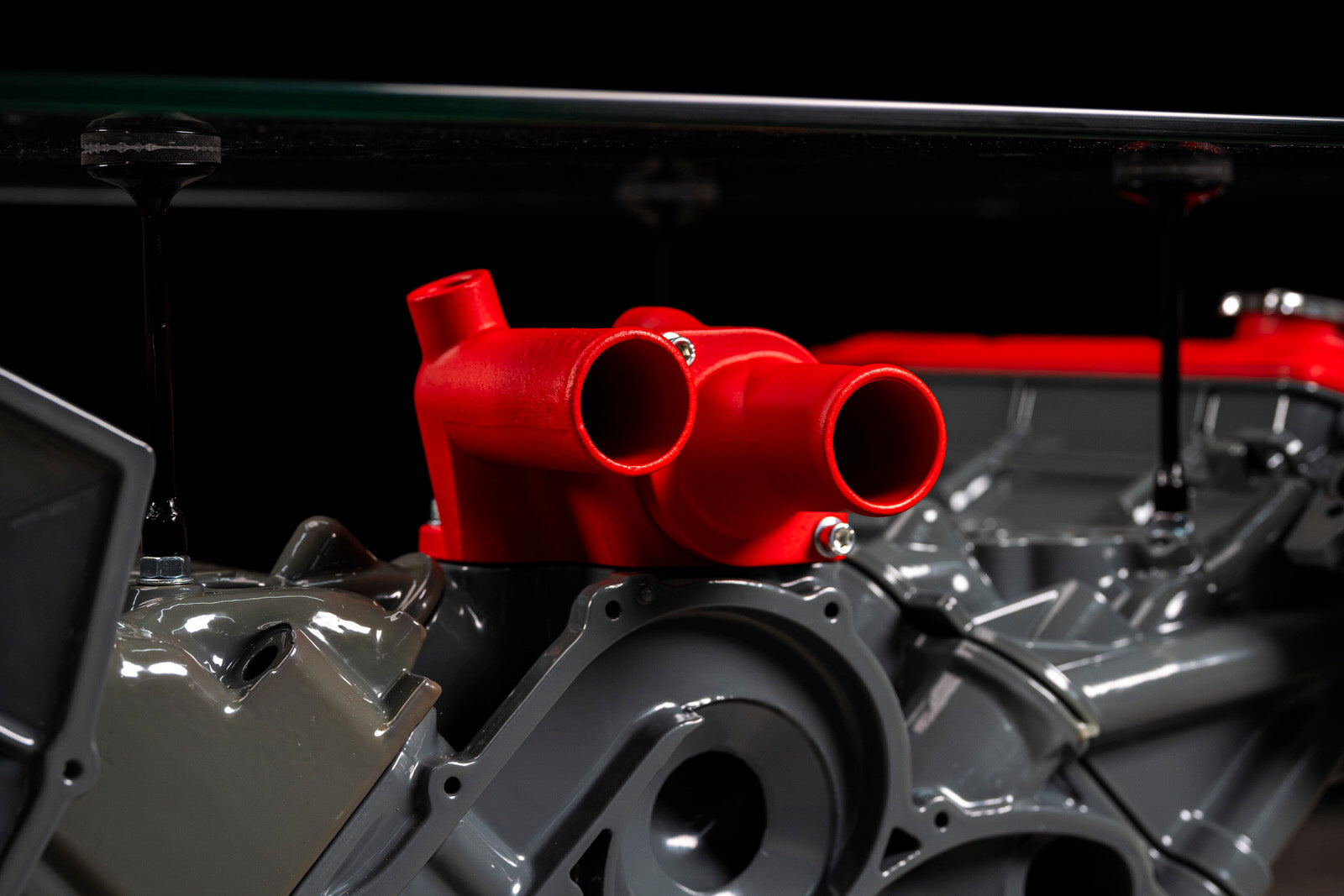 Maserati engine table with glass base