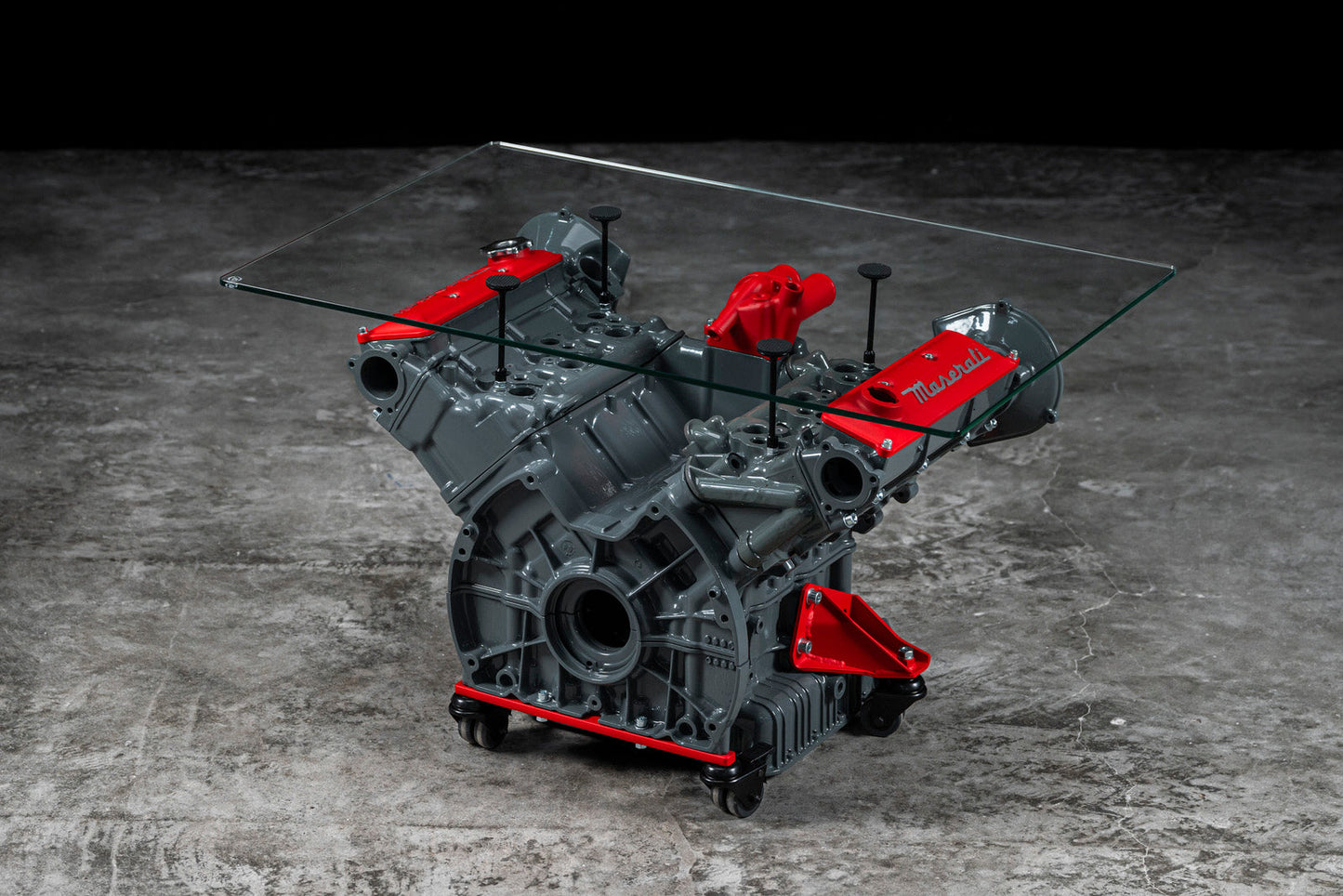 Maserati engine table with glass base