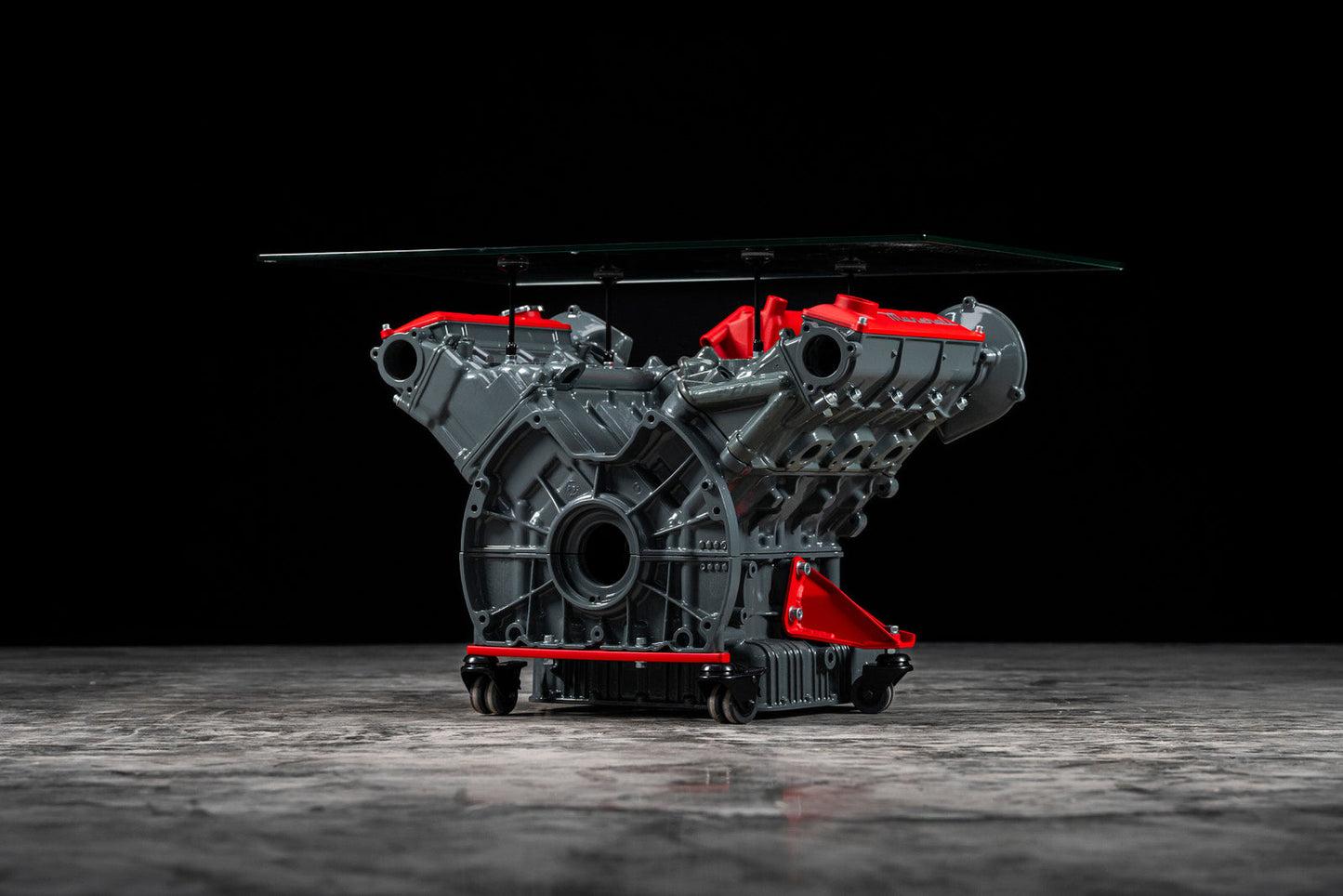 Maserati engine table with glass base