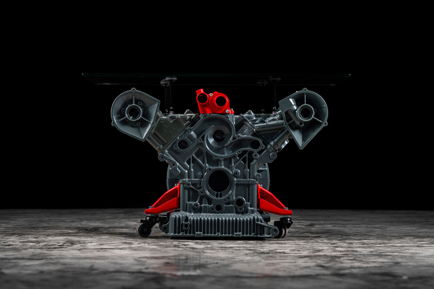 Maserati engine table with glass base