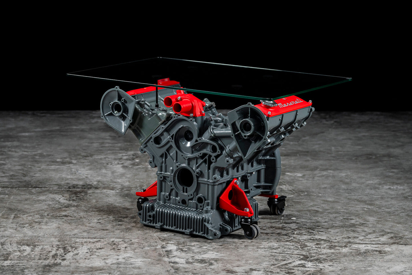 Maserati engine table with glass base