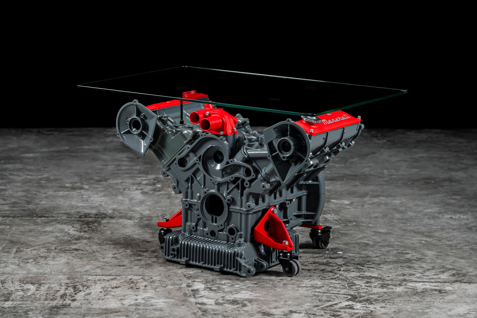 Maserati engine table with glass base